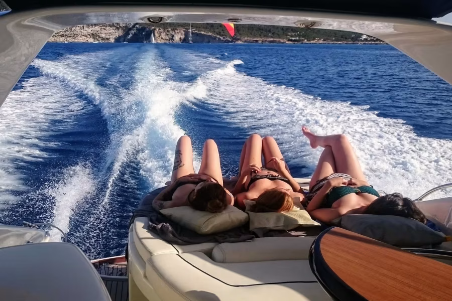 The pleasure of sailing and sunbathing on a boat in Ibiza and Formentera